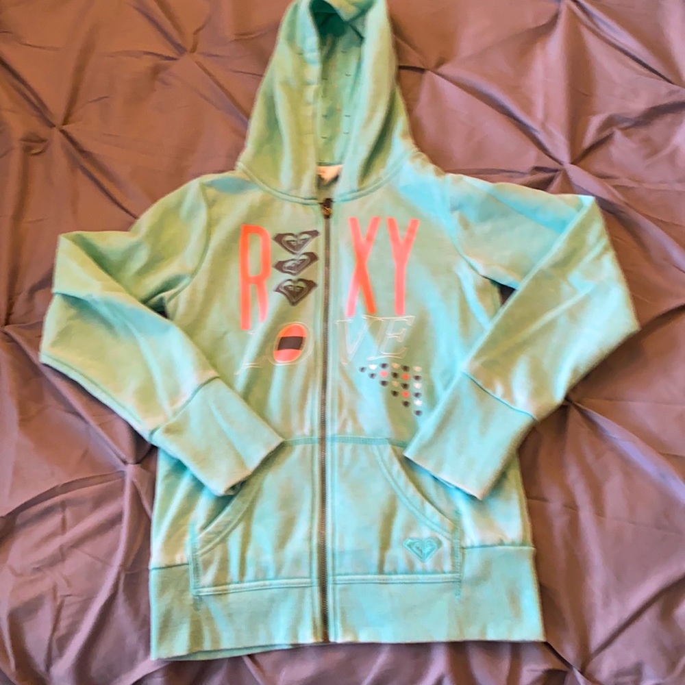 ROXY brand zip up sweat jacket. Size large in girls I believe.